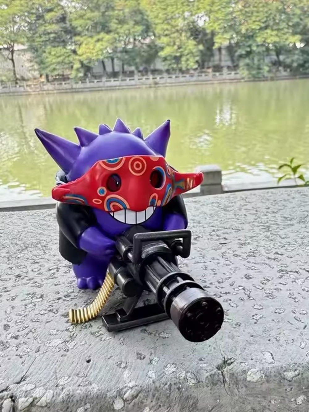 Pokemon Purple Gengar Figure with Red Patterned Mask and Black Machine Gun